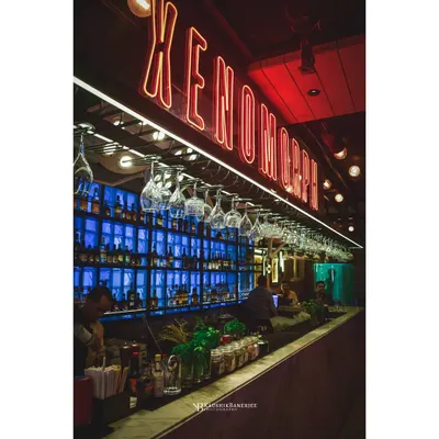 Capturing the electric mood of a bar at night. I use a mix of ambient and artificial light to highlight the key features, from the glowing neon signs to the fully stocked bar, creating an image that invites customers in.