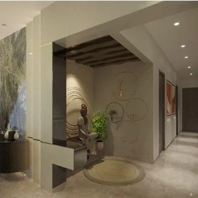 A concept for a peaceful meditation space. The design features a handcrafted Buddha statue on a wooden ledge, set against a textured wall with concentric circles that evoke a sense of calm.