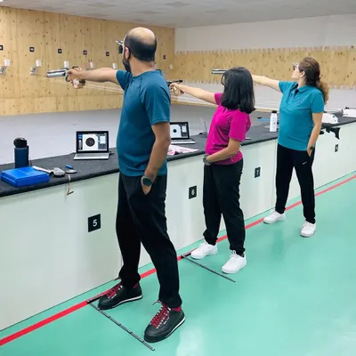 A family learns the basics of air pistol shooting side by side. We provide personalized coaching to ensure everyone, from kids to adults, feels comfortable and confident as they take their first shots.