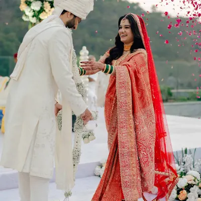 A beautiful candid moment from Shweta's wedding. The flower shower, the smiles, and her natural glow are just everything. This is the kind of soft bridal glam I love to create.