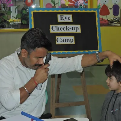 We organized a comprehensive eye check-up camp to ensure the well-being of our students. Here, a qualified professional conducts a thorough examination for early detection of any vision-related concerns.