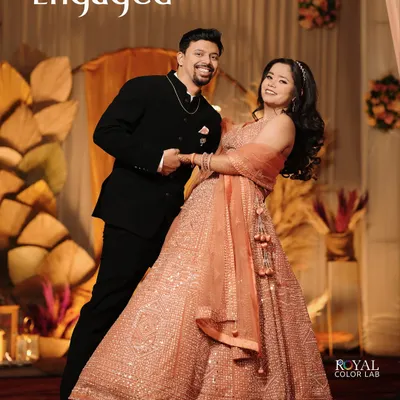 A classic portrait of the newly engaged couple, dancing and celebrating their special moment.