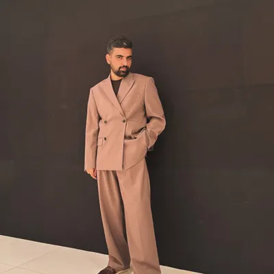 My look for an awards event. I chose a relaxed, double-breasted suit in a muted tone, reflecting my preference for modern, minimalist tailoring.