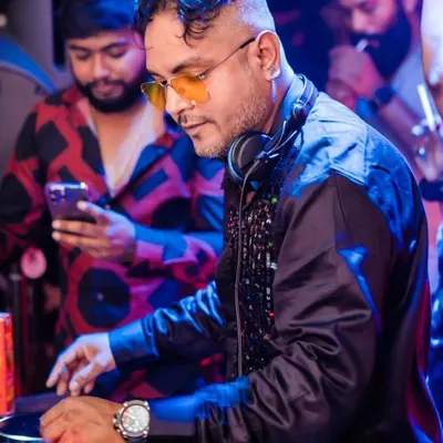 I don't just play music, I translate emotions into sound. Here I am, deep in the mix, creating a Bolly-techno vibe for the dance floor.