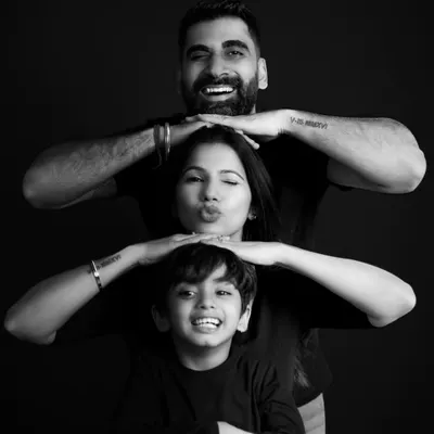 A fun and playful family totem pole! We love capturing the silly, happy moments that truly define a family's personality. This black and white portrait is a favorite.
