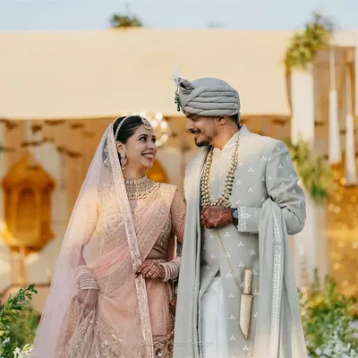 A beautiful, happy moment between the bride and groom. We love capturing these natural smiles and loving glances that tell the story of your relationship.