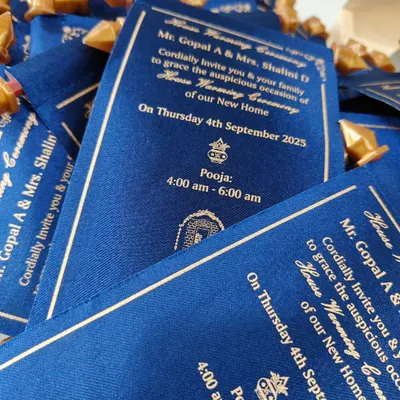 Elevate your housewarming with a touch of royalty. This exquisite scroll invitation, crafted with rich blue satin, is a memorable way to announce your new home. I can personalize it for your perfect celebration.