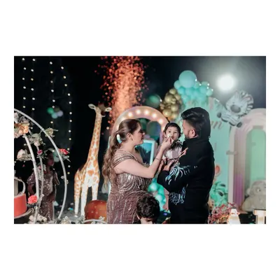 A sweet moment of the birthday boy getting his first taste of cake from his mom. I love capturing these candid, love-filled moments during birthday party celebrations.
