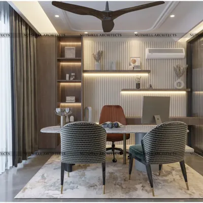 This sophisticated home office is designed for focus and productivity. It features a marble-topped desk, elegant seating for client meetings, and a backdrop of fluted panels and backlit shelving for a touch of modern elegance.