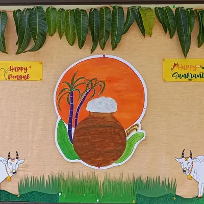Our beautiful classroom board decorated for Pongal and Sankranti, featuring a traditional pot, sugarcane, and decorated bulls.