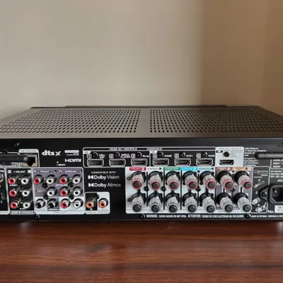 This is the back of the Marantz Cinema 70s AV receiver. It shows all the connection ports needed for a multi speaker Dolby Atmos system. A clean and correct wiring job is crucial for performance, and it's something I take great pride in.