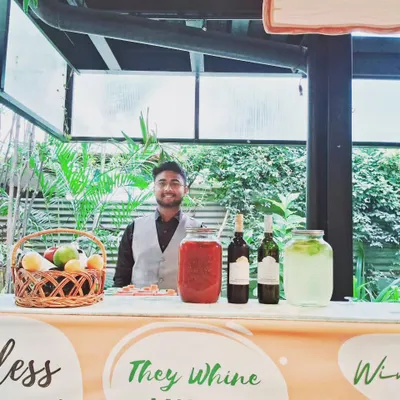 A charming 'Wine Corner' setup perfect for a Sunday brunch. Featuring a selection of wines and freshly made sangria, it’s a great way to encourage guests to relax and mingle.