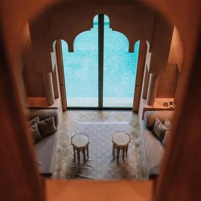 A view from inside the Amanjena resort in Marrakesh during a project for Tom Ford Beauty. The architecture frames the shot naturally. I focus on capturing the unique mood and design of luxury destinations. Shot on the Sony a1.