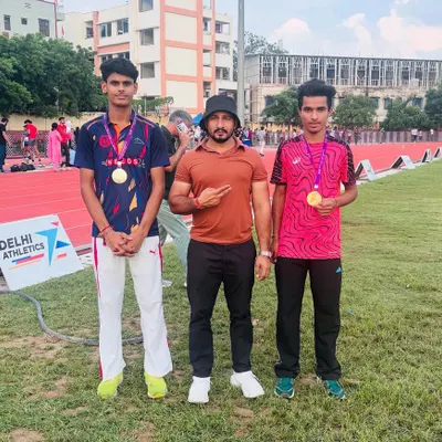 Standing proud with my athletes after their victory at the Open Delhi Athletics Championship. Their gold medals are a testament to their dedication and trust in the process.