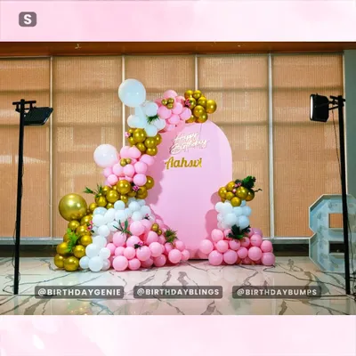 A behind-the-scenes look at our pink and gold birthday setup, showing the professional lighting we use to make sure every detail shines.