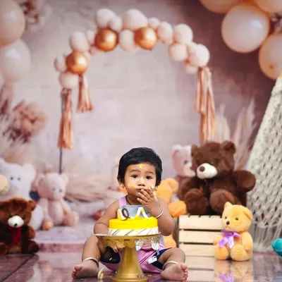 Celebrating a birthday with some new teddy bear friends. This little one is enjoying a taste of cake in our cozy and cute teddy buddy themed setup.