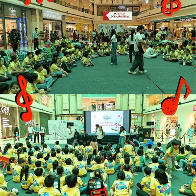 We partnered with Daakroom for a summer camp at Ambience Mall, bringing music and songwriting to over 120 children. This image shows the large-scale, joyful workshop in action.
