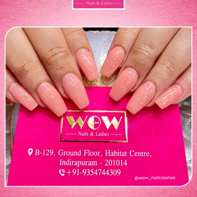 These perfectly sculpted, long coffin nails in a soft peach nude are a statement of simple elegance. Our acrylic extensions provide the perfect canvas for a flawless, single-color manicure that lasts.