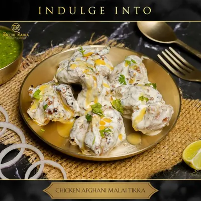 Indulge in our deliciously creamy Chicken Afghani Malai Tikka. Tender chicken pieces marinated in a rich blend of cream, cashews, and mild spices, then grilled to perfection.