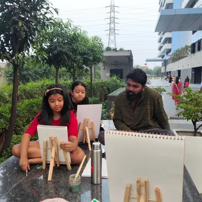 Sometimes we take the art class outside. Painting in nature provides a whole new level of inspiration and a unique experience for the students.