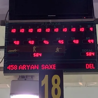A fantastic score of 584/600 by Aryan Saxena in the selection trials, displayed on the electronic scoreboard.