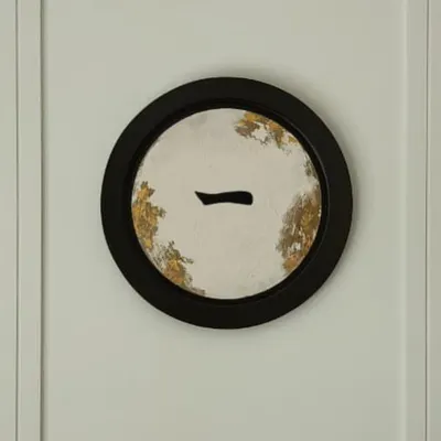A close-up of one of the three pieces in the "Ichi-go ichi-e" set. This circular artwork features Japanese calligraphy on a textured background with gold leaf accents, all within a modern black frame.