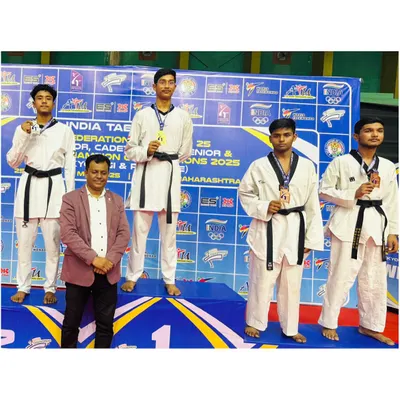 Prateek on the podium after winning a bronze medal at the 1st Federation Cup in Nashik. A proud moment for him and the academy.