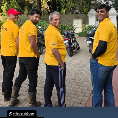 Our crew in uniform yellow polo shirts, ready for a Sunday ride. This sense of unity is what makes our group motorcycle adventures special.