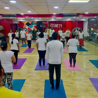 We start our yoga sessions with Tadasana (Mountain Pose) to center ourselves and focus on our breath before flowing through the asanas.