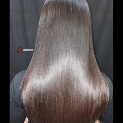 The ultimate goal: liquid shine. This is the result of my permanent hair straightening treatment. The hair is not just straight, it's incredibly glossy, smooth, and reflects light beautifully.