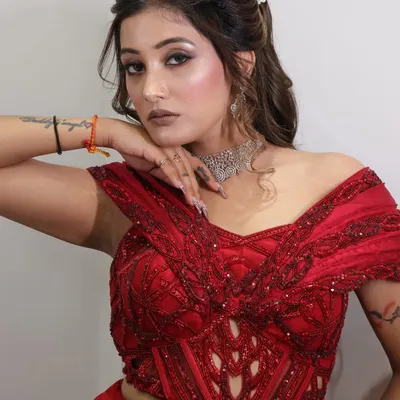 A bold and beautiful look for a reception or cocktail event. The dramatic winged eyeliner and smokey shadow are paired with a contoured base and a nude lip.