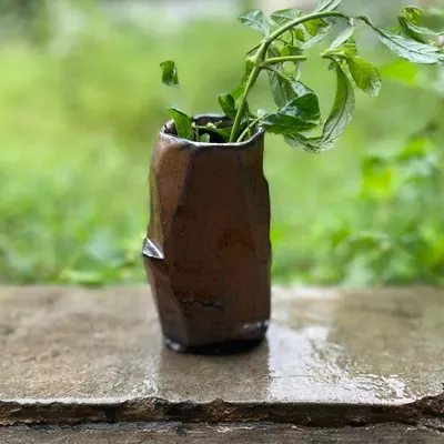 This hand-built Kurinuki vase was from a batch that failed, but its form is too beautiful not to share. The Japanese Kurinuki technique involves carving from a solid block of clay.