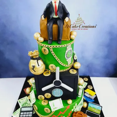 A cake for the boss! This three-tier corporate-themed cake is all about the world of finance, featuring an edible vault, money bags, a stock market graph, and a custom figurine of the birthday boss himself.