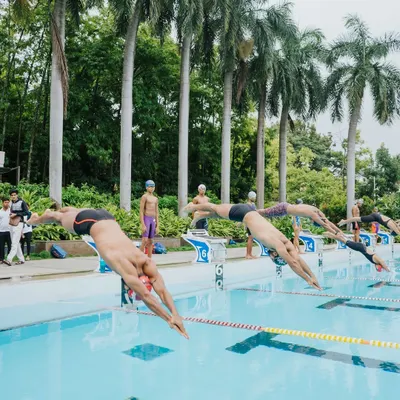 This is the moment it all begins. Our competitive swimmers launch from the starting blocks, a display of power, precision, and synchronized focus that we cultivate in every training session.