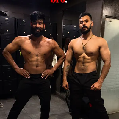 "How it feels to train with bro." A side-by-side comparison of physiques with my training partner.