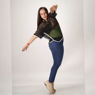 A moment from a dance photoshoot. I believe your vibe and attitude speak through your movement.