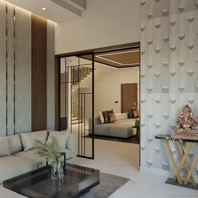 We’re thrilled with how this living room turned out. The design uses a mix of materials including marble paneling, textured paint, and wooden flutes to create a space that is luxurious, warm, and full of visual interest.