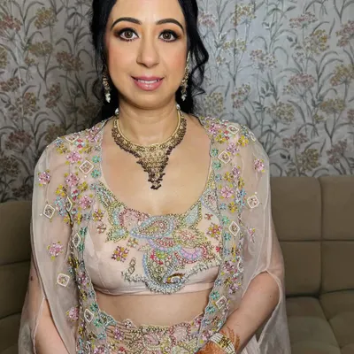 A beautiful, elegant makeup look for mature skin. I used soft, flattering tones and a lightweight base to create a radiant finish that enhances her natural beauty for a wedding event.
