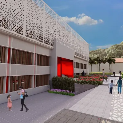 Our design for the UNACCO School in Chanung, envisioned as the largest sports residential school in India, featuring a modern academic building with a distinctive perforated facade.