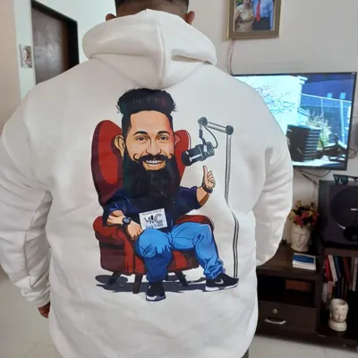 Your caricature isn't just for the wall. I can have your personalized artwork printed on high-quality apparel, like this custom hoodie, making it a truly unique and wearable piece of art.