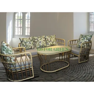 This beautiful rattan-style sofa set includes a two-seater, two single chairs, and a matching coffee table. The natural finish of the frame paired with leafy-print cushions creates a fresh, nature-inspired look. It’s a perfect set for creating a relaxed and stylish lounge area on your patio or in your garden.
