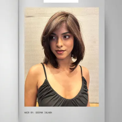 Layers, volume, and dimension redefined. This chic hair makeover showcases a stylish story in every strand.