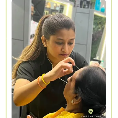 Witness our aesthetician's skillful technique in action with our signature eyebrow threading service. We believe that well-shaped brows are fundamental to your look, and our team is trained to provide precise, symmetrical results that enhance your natural bone structure.