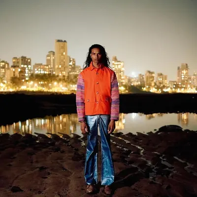 A powerful editorial shot for designer Amesh Wijesekera against the Mumbai skyline. I kept the model's long hair natural and the grooming minimal to fit the authentic, cross-cultural theme.