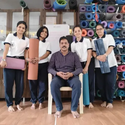 Pictured here with a group of dedicated students in our studio. I am committed to providing clear, hands-on guidance to help each individual progress in their practice at their own pace.