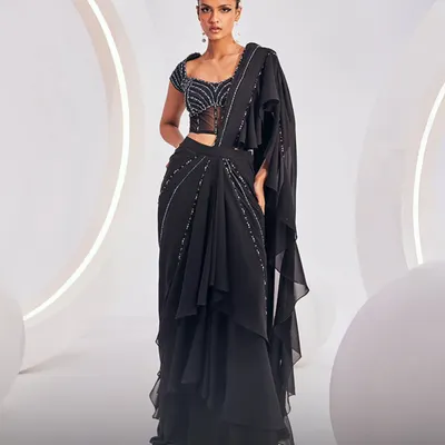 The Nerio Saree Set, a perfect example of contemporary cocktail dressing with its pre-draped silhouette and embellished blouse.