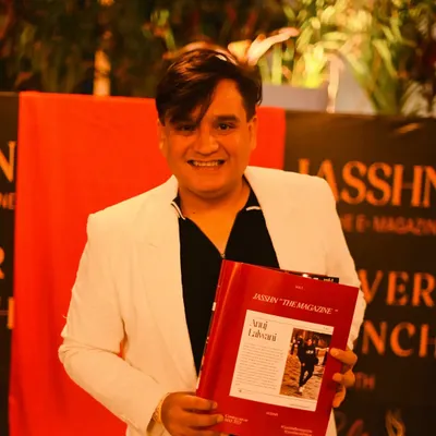 Holding a copy of Jasshn The E-Magazine, which featured a beautiful article about my work. I'm truly blessed and grateful for the feature.