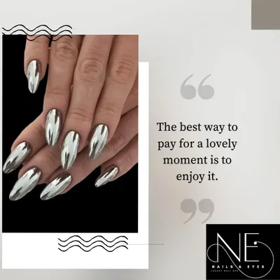 These full-coverage silver chrome nails are the definition of futuristic chic. The liquid-metal effect on long, almond-shaped nails creates a stunning, reflective surface.