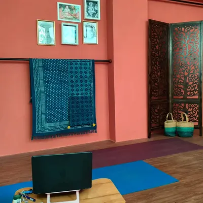 A peek into our dedicated online studio. We have created a serene and professional setup to ensure our online students receive a high-quality experience with clear audio and video.