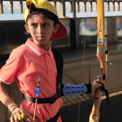 The focused gaze of a young competitor at our Under-10 selection trials. This is where we spot the determination and skill needed for competitive archery.